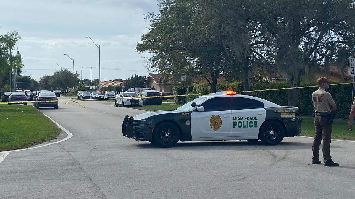 Miami-Dade police block access to Southwest 92nd Avenue at Southwest 21st Street on Friday, Dec. 8, 2023.