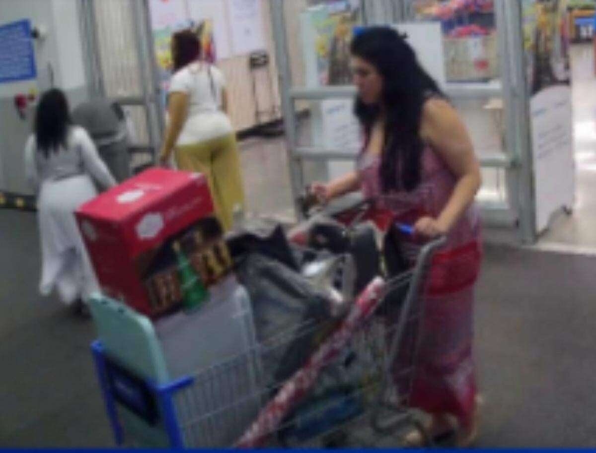 Security camera footage shows Lubby Navarro walking out of Walmart with a cart full of personal items Miami-Dade County State Attorney’s Office prosecutors say she bought with her school district-issued credit card. 