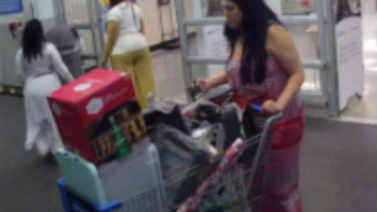 Security camera footage shows Lubby Navarro walking out of Walmart with a cart full of personal items Miam-Dade County State Attorney’s Office prosecutors say she bought with her school district-issued credit card.