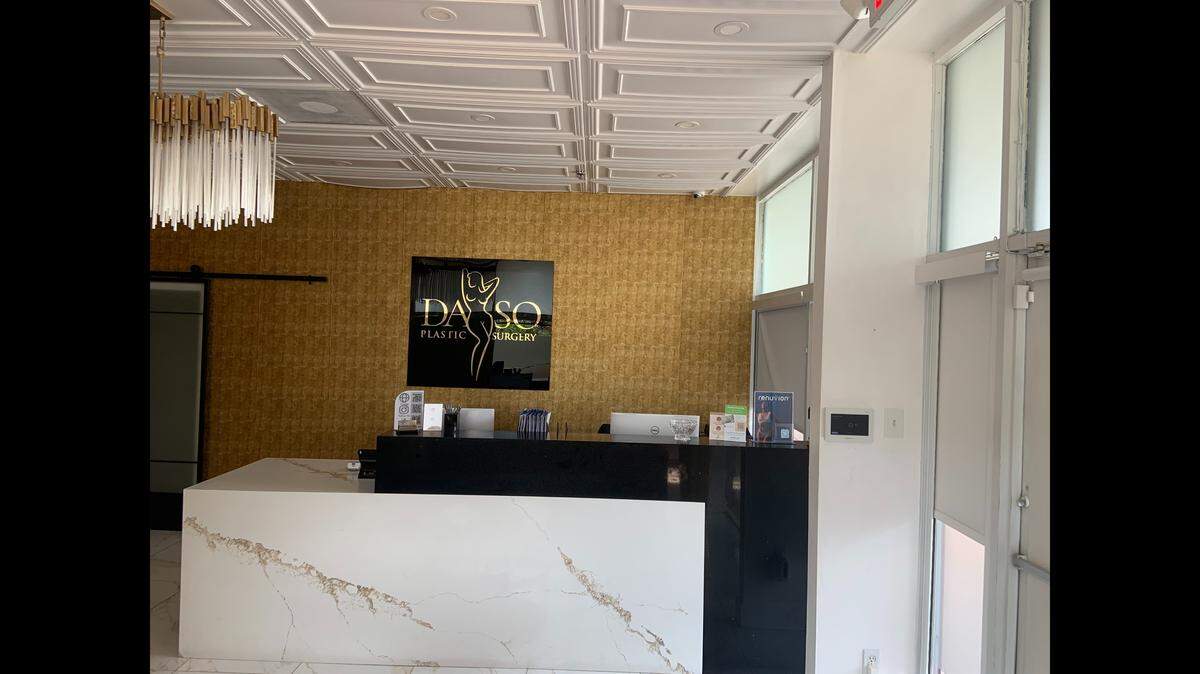 The sign inside 7902 NW 36th St., Suite 201, calls the place Daso Plastic Surgery while the signs outside say it’s “Venus Cosmetic Surgery” and the state license registration says “Venus Cosmetic Institute.”