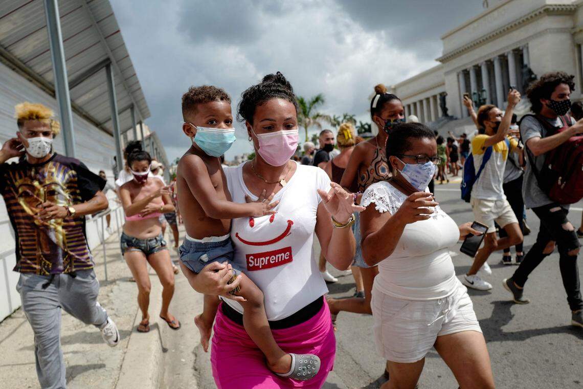 Many families marched near the Capitol Building in Havana to demand improvements to their quality of life.