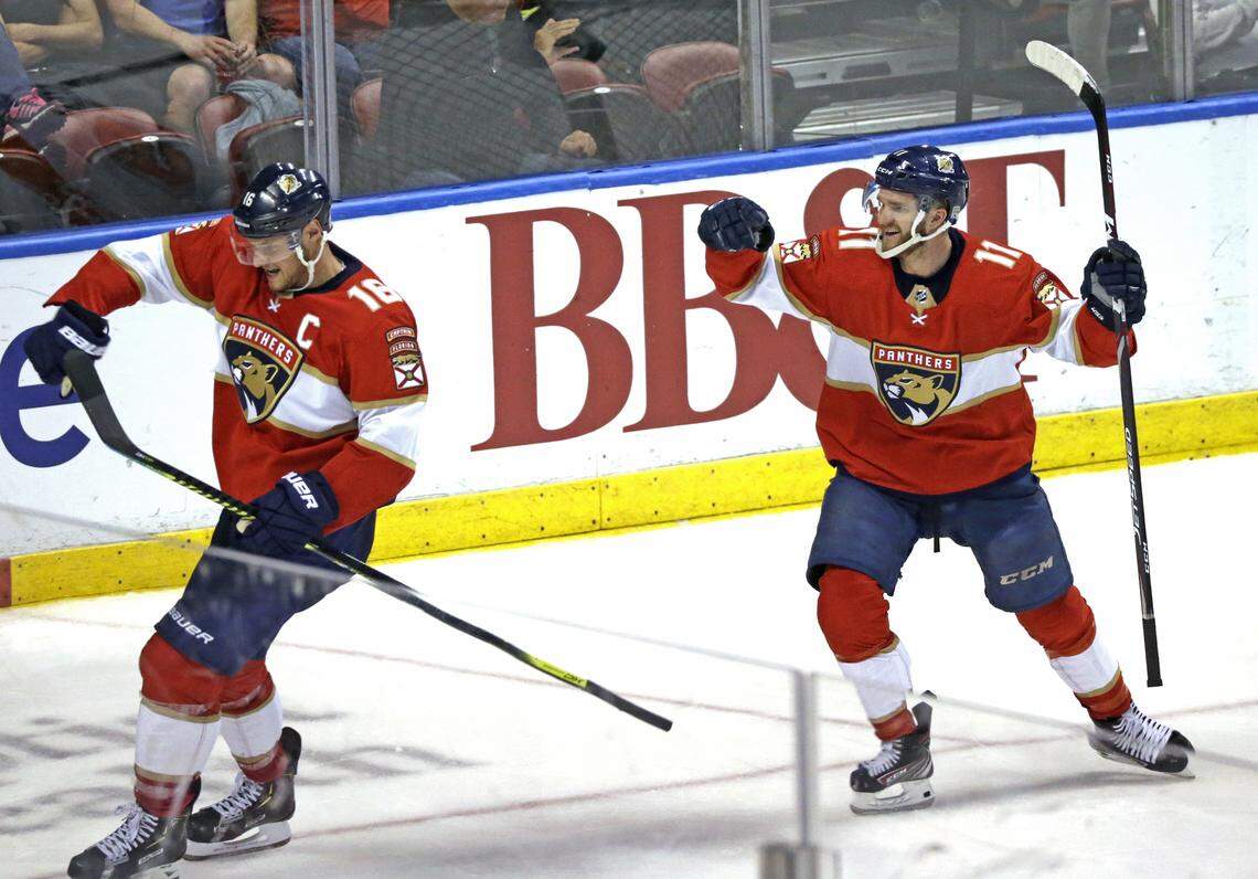 Florida Panthers center Aleksander Barkov (16) celebrate with teammate Jonathan Huberdeau (11) after scoring a goal against Philadelphia Flyers goalie Carter Hart (79) during the third period&nbsp;of an NHL regular season hockey game at the BB&T Center on Thursday, February 13, 2020 in Sunrise.