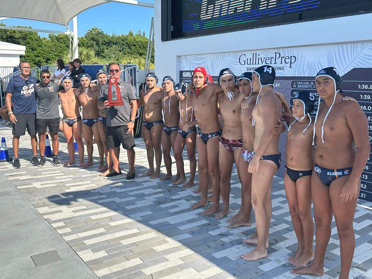 The Mater Lakes boys’ water polo team accepts their first regional championship trophy on Thursday after beating Ransom Everglades on Thursday afternoon at Gulliver Prep.