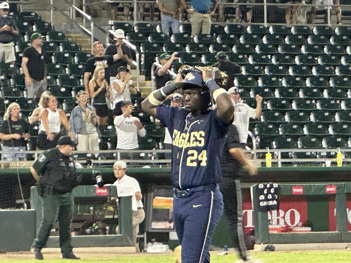 North Broward Prep’s Marcus Hall walks slowly off the field after the Eagles lost a heartbreaker to Santa Rosa Beach South Walton in the Class 3A state baseball championship game on Thursday night at Hammond Stadium in Fort Myers, Fla.