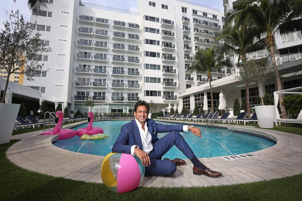 Hersha Hospitality Trust CEO Neil Shah sits poolside at the recently renovated Cadillac Hotel and Beach Club, at 3925 Collins Ave in Miami Beach Friday, Nov. 30, 2018.