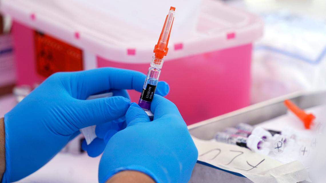 A flu vaccine is readied at the L.A. Care and Blue Shield of California Promise Health Plans’ Community Resource Center, which offered free flu and COVID-19 vaccines Friday, Oct. 28, 2022, in Lynwood, Calif.