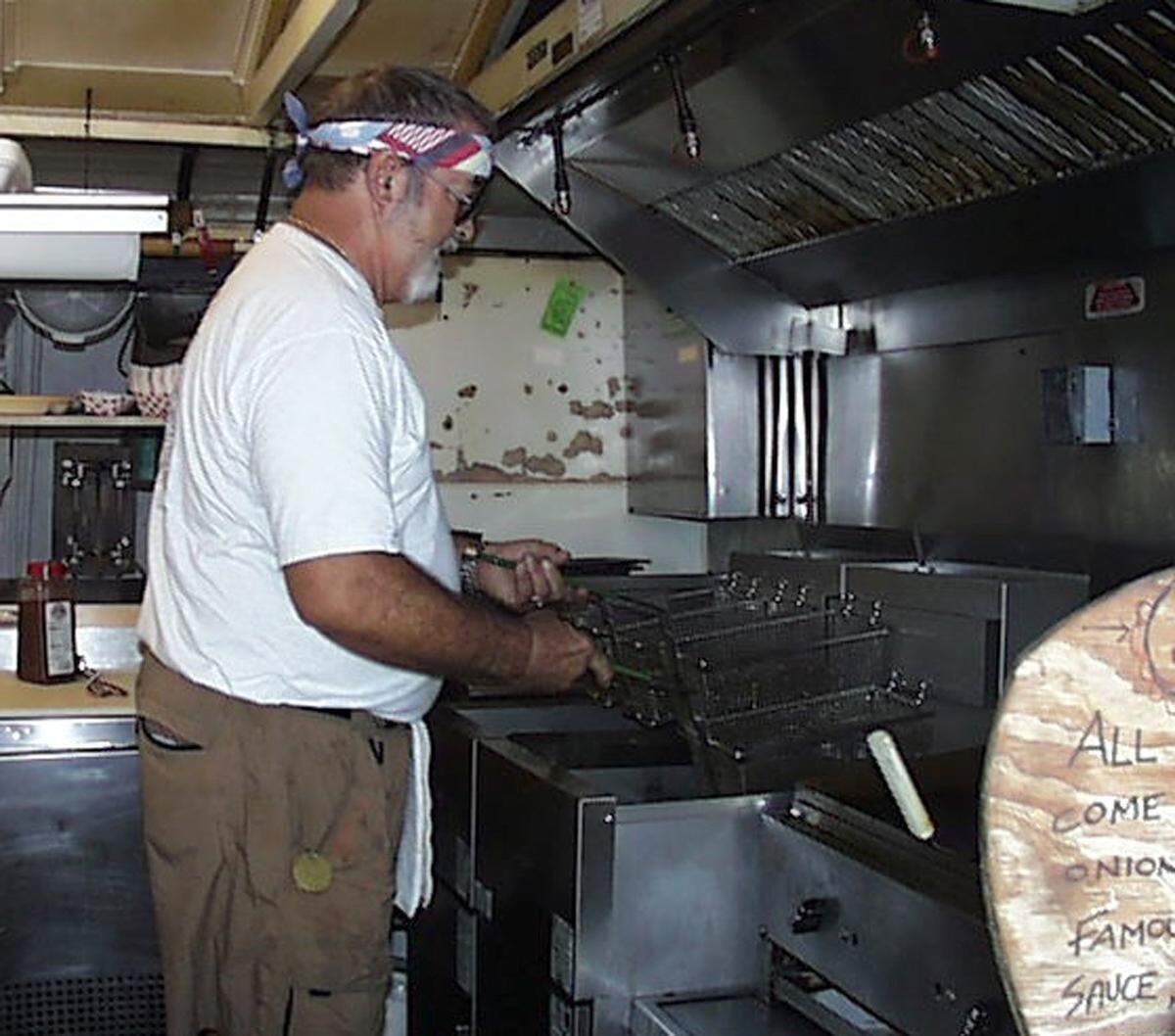 Buddy “BO” Owens gets things going at the deep fryer at his popular BO’s Fish Wagon at the corner of William and Caroline streets. Owen was a standout athlete for Key West High School. He previously operated BO’s on Duval Street.