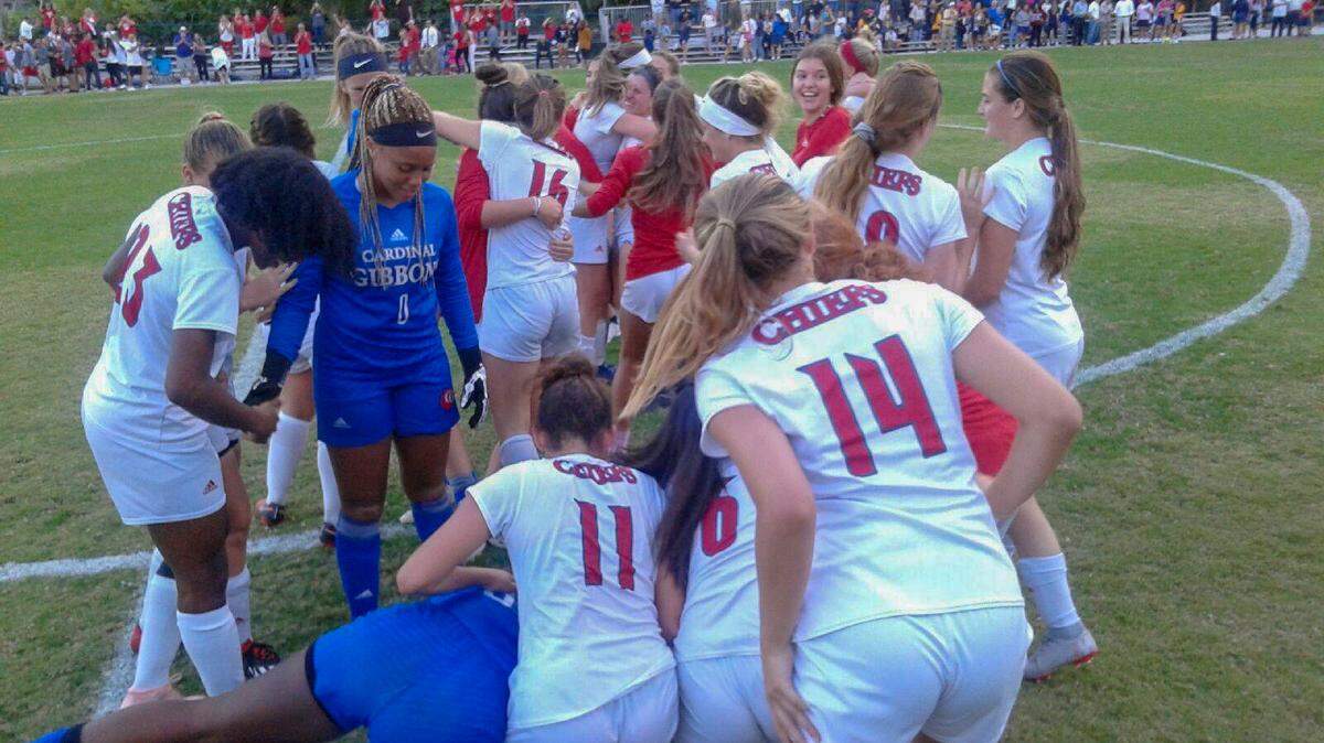 The Cardinal Gibbons girls’ soccer team celebrates its come-from-behind victory over Carrollton in the Class 2A regional finals on Tuesday, Feb. 12, 2019.