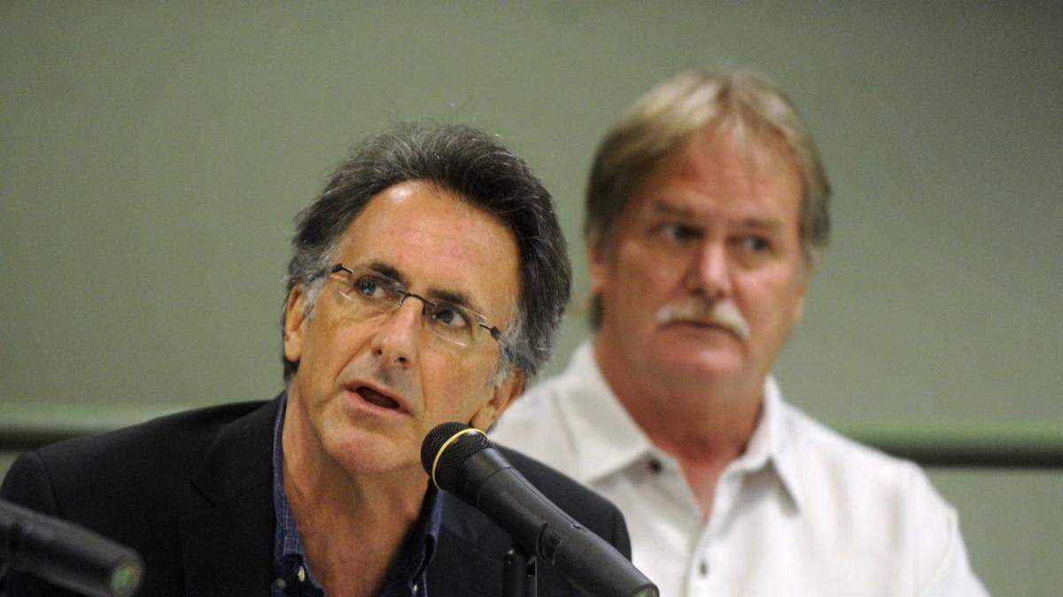 David Hastings, left, speaks at a climate change solutions summit in St. Petersburg during October 2014. Hastings has been named in a sexual exploitation lawsuit filed against Eckerd College, his former employer.