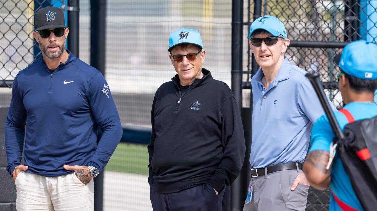 Gabe Kapler on left alongside owner Bruce Sherman and minority owner David Ott during spring training, has been promoted to Marlins general manager.