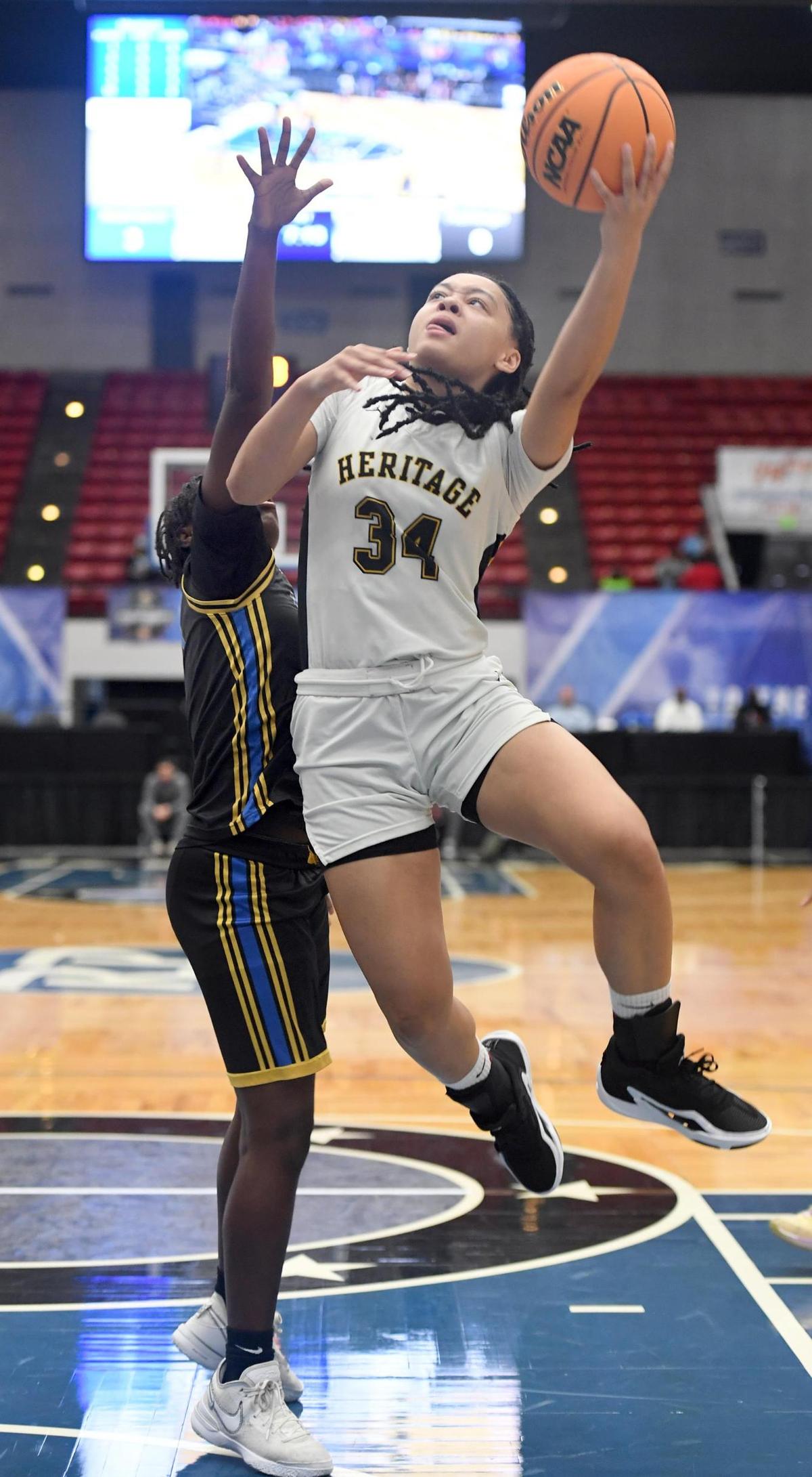 American Heritage’s Jasleen Green (34) shoots against Mainland in the Class 5A final during the Florida High School State Championships at the RP Funding Center in Lakeland, Fl on Friday March 8, 2024. Green was the game-high scorer with 27 points. American Heritage defeated Mainland 60-55. Scott Wheeler | Photo