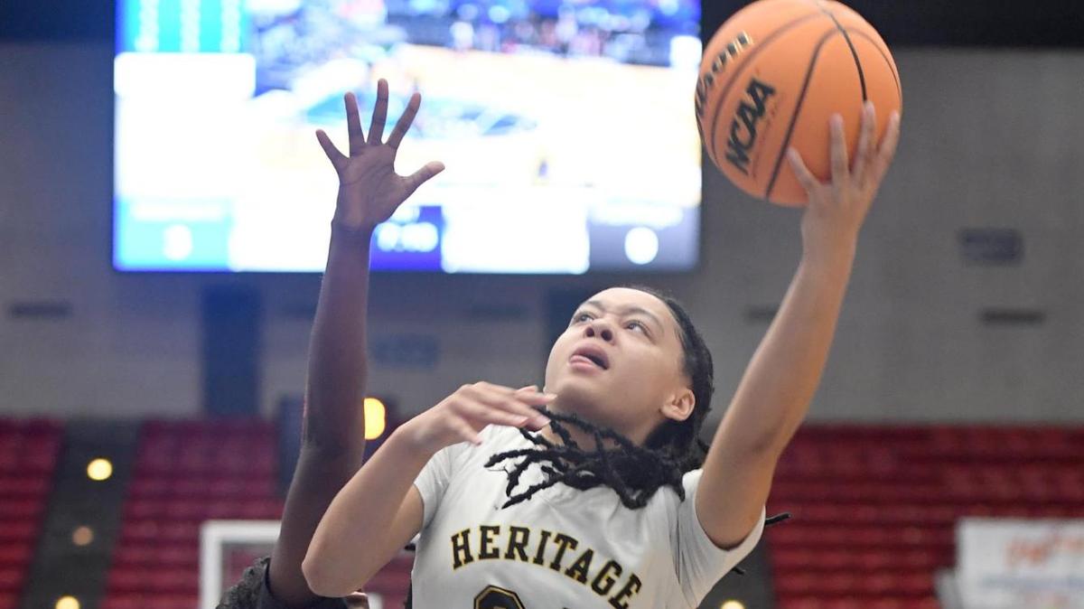 American Heritage’s Jasleen Green (34) shoots against Mainland in the Class 5A final during the Florida High School State Championships at the RP Funding Center in Lakeland, Fl on Friday March 8, 2024. Green was the game-high scorer with 27 points. American Heritage defeated Mainland 60-55.