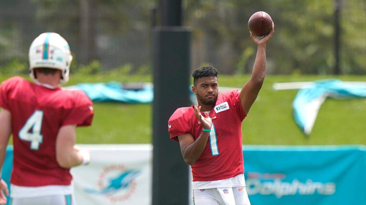 Miami Dolphins quarterback Tua Tagovailoa (1) throws during NFL football practice, Wednesday, Aug. 25, 2021, in Miami Gardens, Fla. (AP Photo/Lynne Sladky)