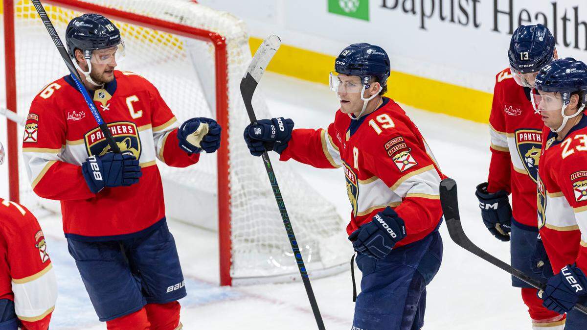 Florida Panthers left wing Matthew Tkachuk (19) celebrates with his teammates after scoring a goal against the Chicago Blackhawks in the second period of their NHL game at Amerant Bank Arena on Saturday, Feb. 1, 2025, in Sunrise, Fla.