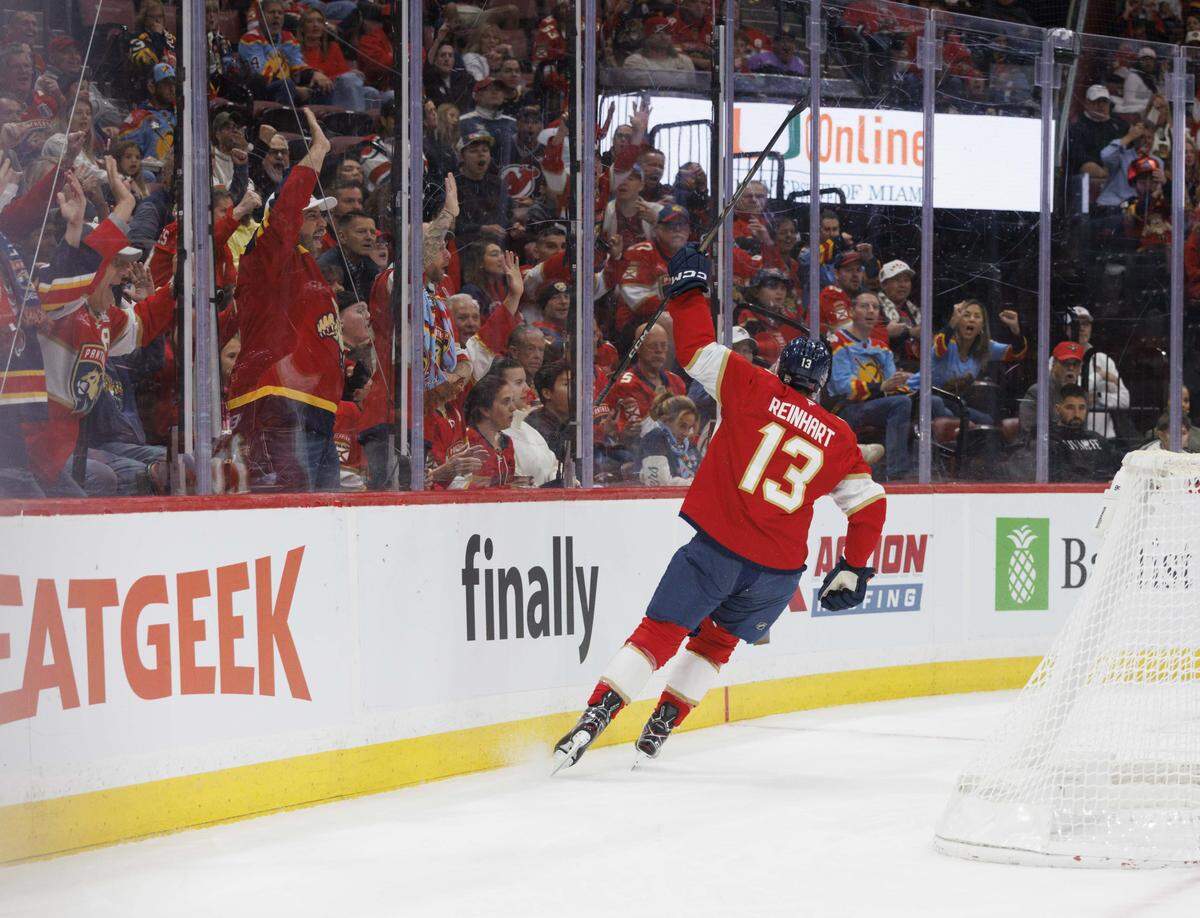Florida Panthers center Sam Reinhart (13) celebrates scoring a goal during the first period of a game against the New Jersey Devils on Thursday, Nov. 20, 2025, at Amerant Bank Arena in Sunrise, Fla.