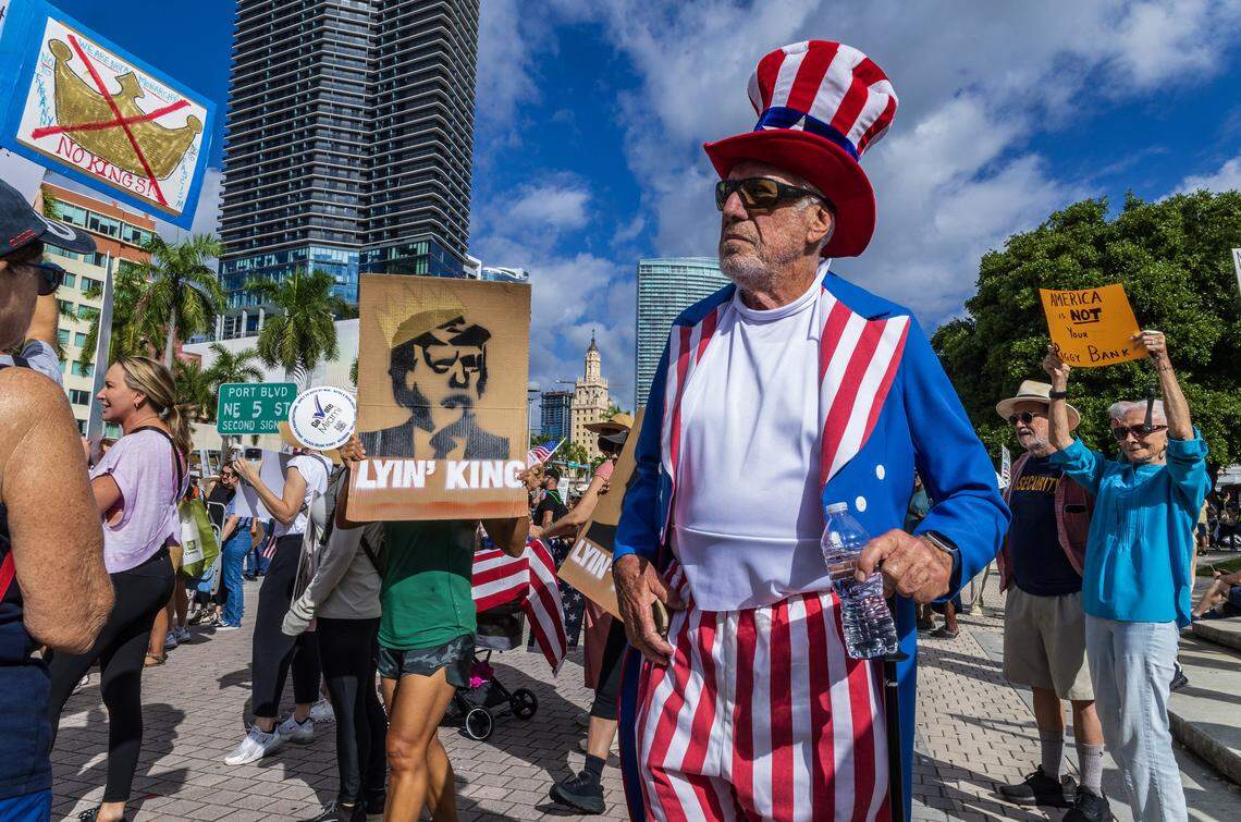 Ed of Coral Gables dresses as Uncle Sam at the Torch of Friendship in downtown Miami during the ‘No Kings’ anti-Trump protests taking place nationwide and all across South Florida.