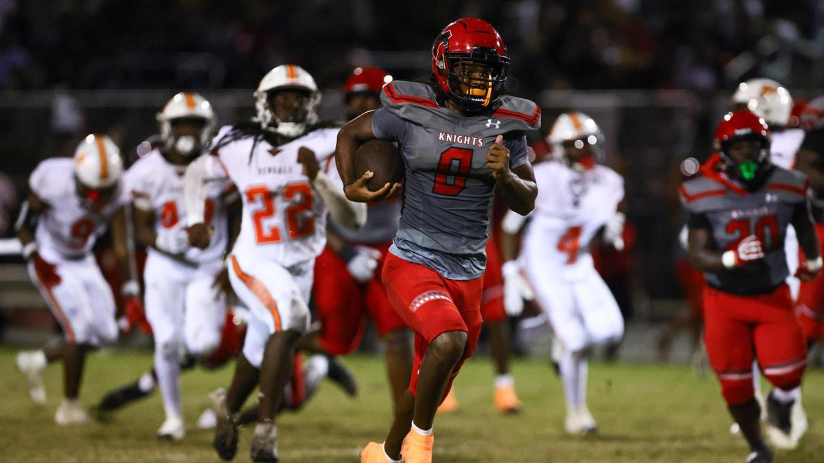 Monarch Knights wide receiver Samari Reed (0) runs with the football for a touchdown against the Piper Bengals during the second quarter of a high school football game at Don Conkel Stadium at Coconut Creek High School in Coconut Creek, Florida, Thursday, October 24, 2024.