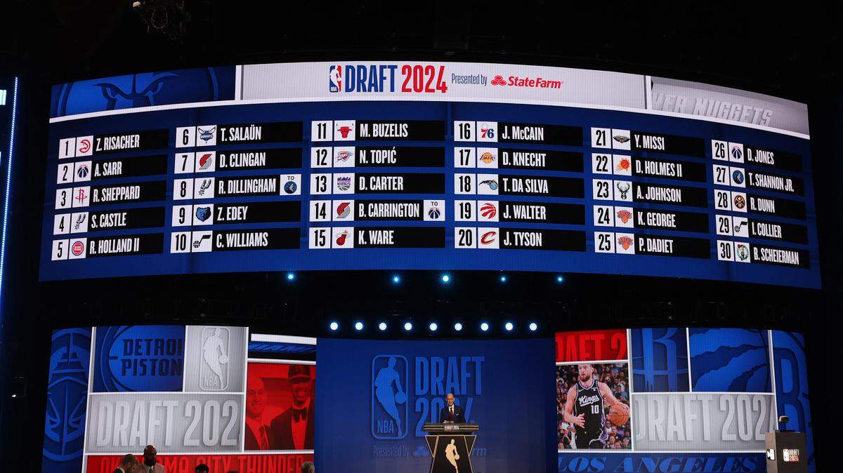 NBA commissioner Adam Silver speaks at the podium after the first round of the 2024 NBA Draft at Barclays Center.