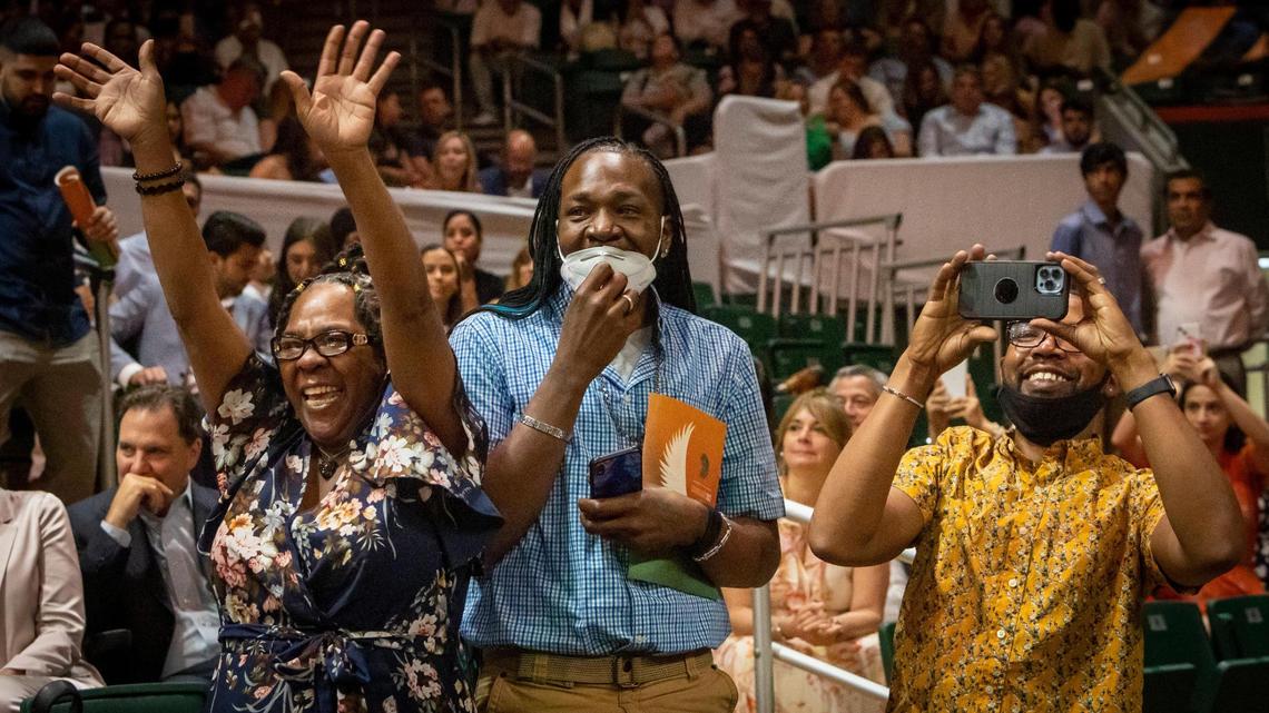 Cheering for University of Miami graduate Cleveland Reed Jr. are, from left, Teresa Reed, his aunt, and his cousins Ozzie Marion and Karl Daniels at the University of Miami graduation ceremony in Coral Gables on Friday, May 13, 2022.