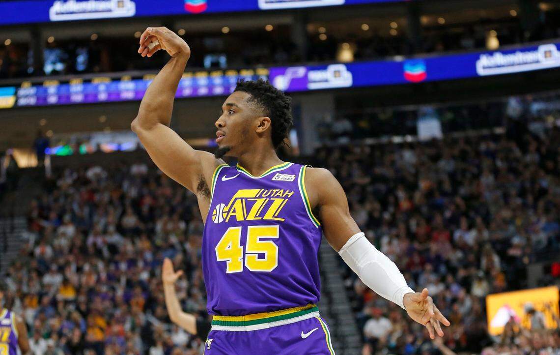 Utah Jazz guard Donovan Mitchell (45) follows through as he scores a 3-pointer against the Charlotte Hornets during the second half of an NBA basketball game, Monday, April 1, 2019, in Salt Lake City.