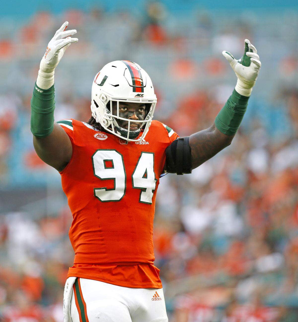 Miami Hurricanes defensive lineman Trevon Hill motivates the fans at Hard Rock Stadium during the game against Bethune-Cookman on Saturday, September 14, 2019.