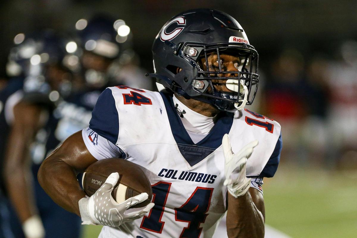 Columbus Explorers running back Sedrick Irvin (14) runs with the football during the first half of a high school football game against the Palmetto Panthers at Tropical Park in Miami, Florida, Friday, September 16, 2022.