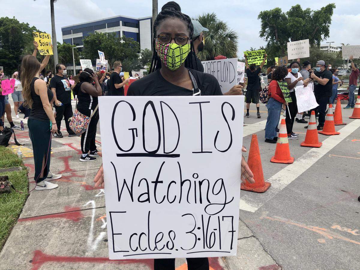 Torrie Jackson, 29, a Kendall resident, attended a protest against racism and police brutality outside the Trump National Doral resort.