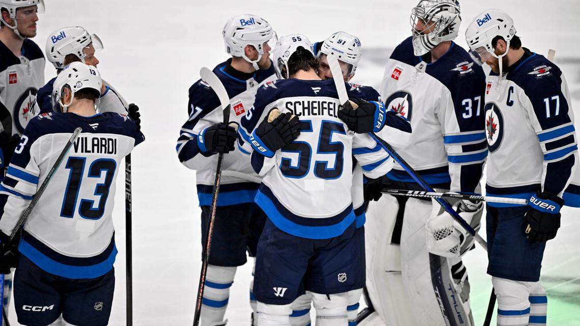 May 17, 2025; Dallas, Texas, USA; The Winnipeg Jets console center Mark Scheifele (55) as Scheifele leaves the penalty box after the loss to the Dallas Stars during the overtime period in game six of the second round of the 2025 Stanley Cup Playoffs at American Airlines Center. Mandatory Credit: Jerome Miron-Imagn Images