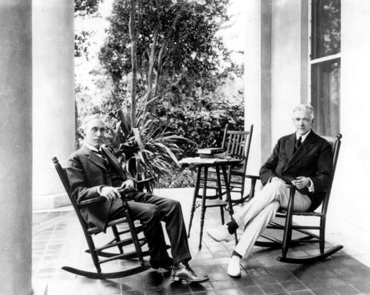 Dr. James Jackson, left, sits on the back porch of his Brickell Avenue home with a family friend, Lewell S. Barker, circa 1920.