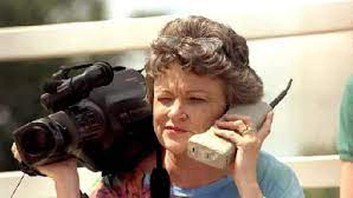Pulitzer Prize winning reporter Lucy Morgan seen here in the 1980s, multi-tasking.