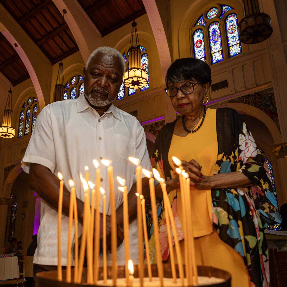 Aaron and Betty Kennedy silently reflect near a prayer stations near the church sanctuary area inside Trinity Episcopal Cathedral during Vox Dei, a new interactive service of Holy Eucharist, on Sunday, September 7, 2025, in Miami, Fla. Trinity Episcopal Cathedral is celebrating the centennial anniversary of the church.