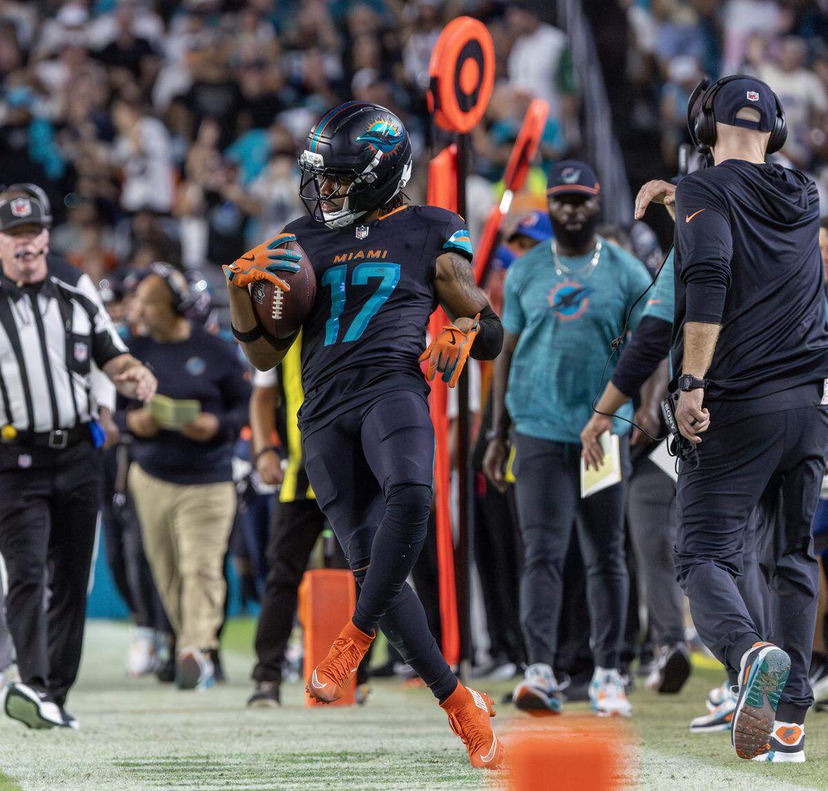 Miami Dolphins wide receiver Jaylen Waddle (17) celebrates after a first down during the second half of an NFL game against the New York Jets on Monday, Sept. 29, 2025, at Hard Rock Stadium in Miami Gardens, Fla.