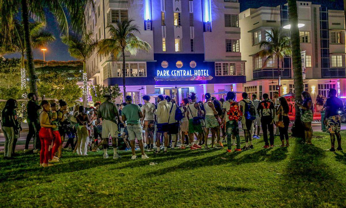 Spring breakers hang out on Ocean Drive on Saturday, March 26, 2022.
