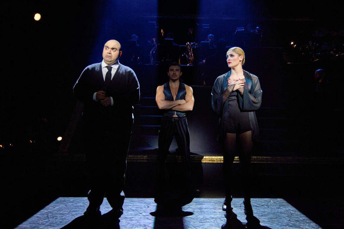 Christopher Cline as Sergeant Fogarty, center, with Andrew Metzger as Amos and Ellie Roddy as Roxie Hart in the national touring company of “Chicago” coming to the Adrienne Arsht Center.