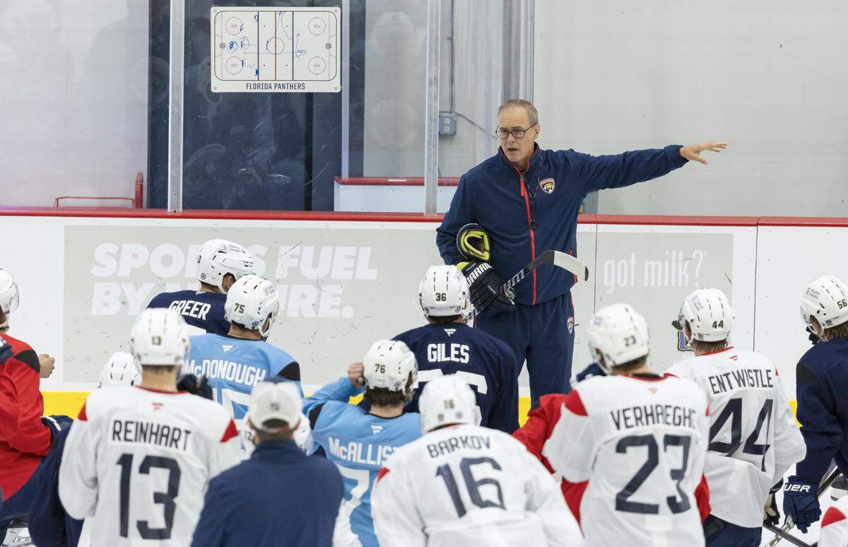 Florida Panthers head coach Paul Maurice talks to his players during training camp at the Baptist Health IcePlex on Thursday, Sept. 19, 2024, in Fort Lauderdale, Fla.