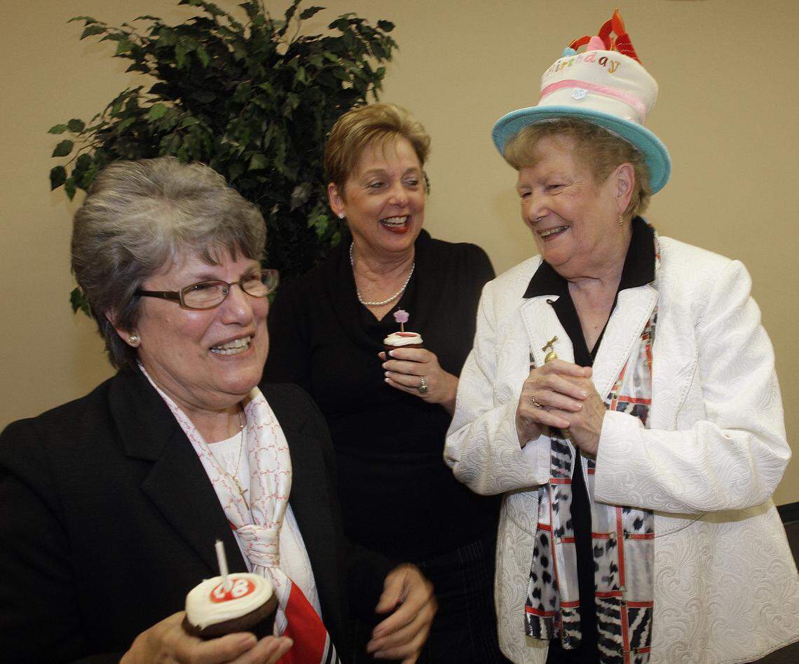 Sister Jeanne O’Laughlin, right, celebrated her 80th birthday at a party at Barry University on May 4, 2009. Sister Linda Bevilacqua, then president of Barry, left, and Ann E. Paton, a vice president at the university, center, celebrated with O’Laughlin.