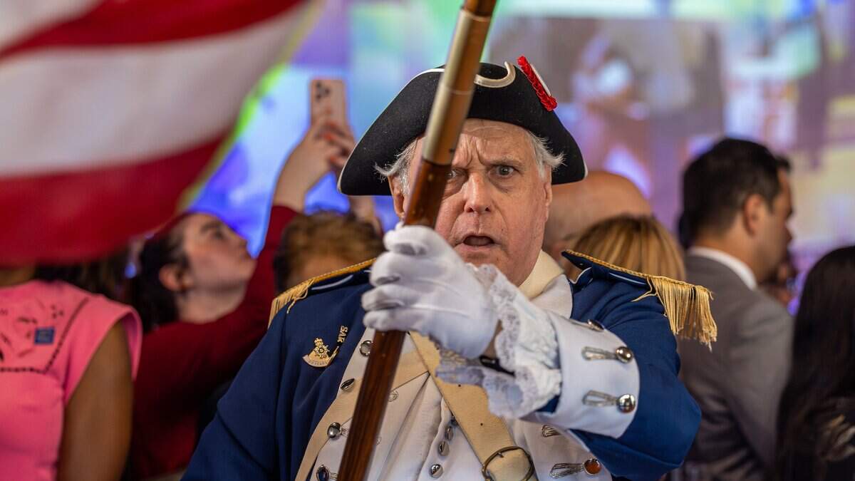 David Mitchell, commander of the Color Guard for the Sons of the American Revolution Miami Chapter, leads a ceremonial procession during a press preview of the “Documents that Forged a Nation” exhibit at the Museum of Miami in Miami, Fla., on Wednesday, June 17, 2026.
