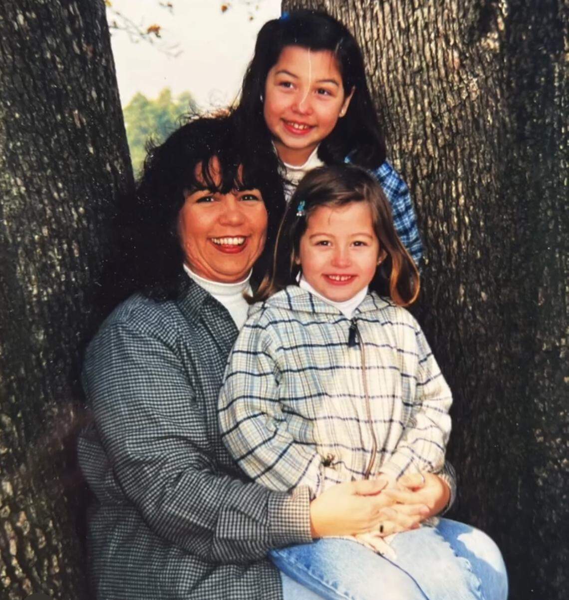 Gloria Marcia Hall, 40, and her two daughters. Hall was killed in a Hialeah crash on Aug. 12, 2006.
