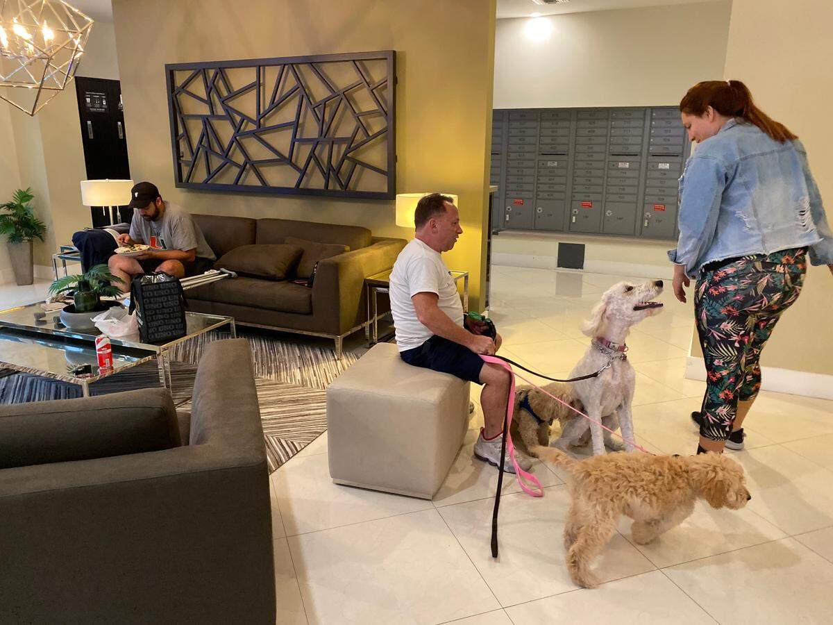 The Place at Dania Point residents waiting in the lobby.