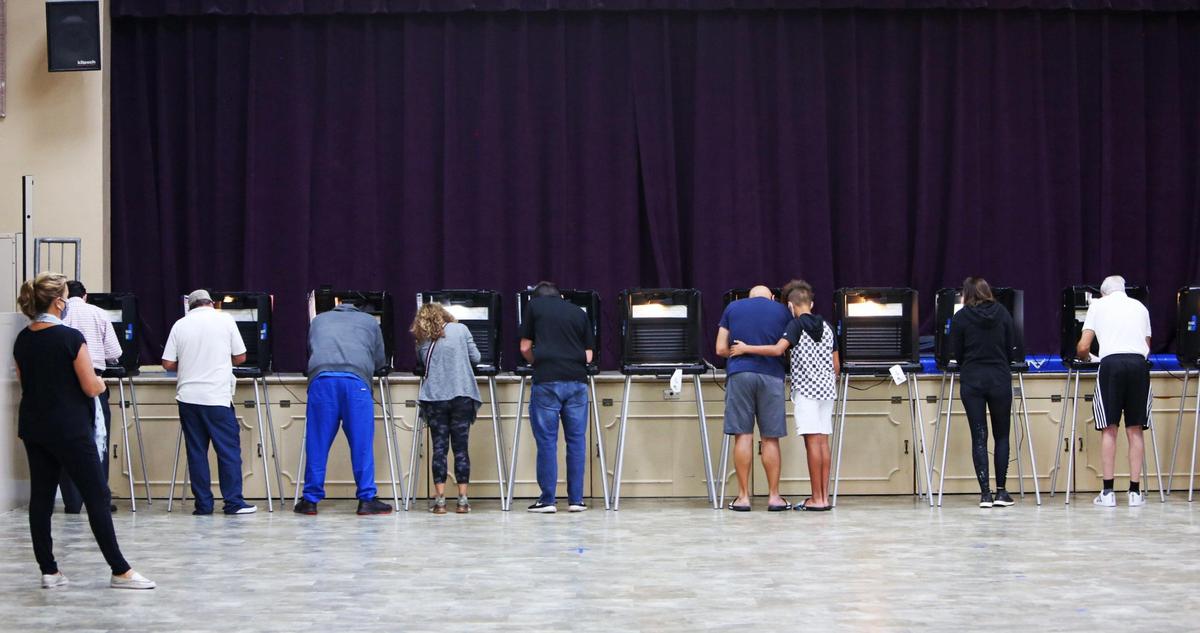 Miami Shores voters fill in their ballots at the C. Lawton McCall Community Center on Election Day, Nov. 3, 2020.