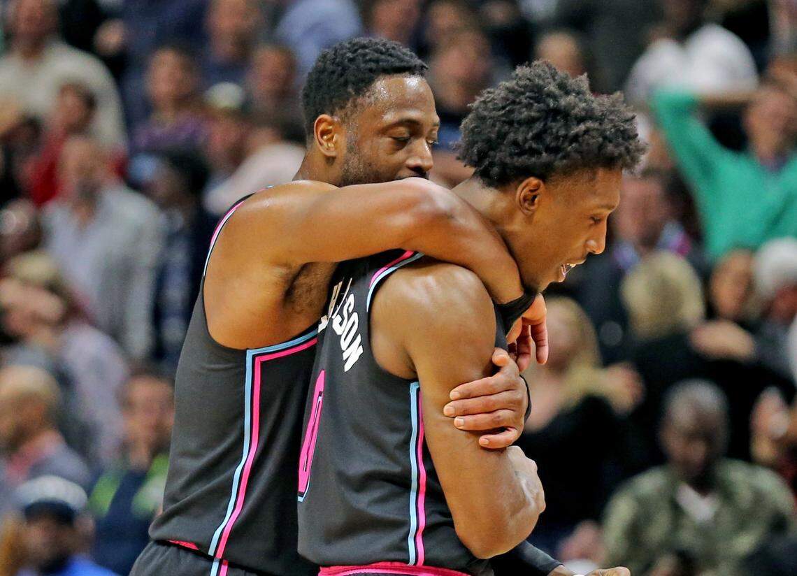 Miami Heat Dwyane Wade grabs Josh Richardson after Richardson missed the final shot of the game allowing a victory for the Atlanta Hawks at the AmericanAirlines Arena in  Miami, Florida, Tuesday, November, 27, 2018.