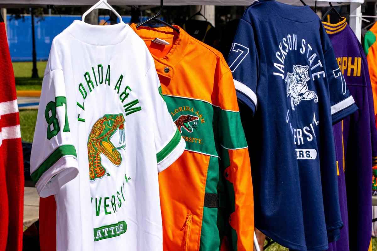 Collegiate apparel hangs ready for sale during the 6th Annual South Florida HBCU Picnic at Florida Memorial University in Miami Gardens, Florida, on Saturday, July 9, 2022.