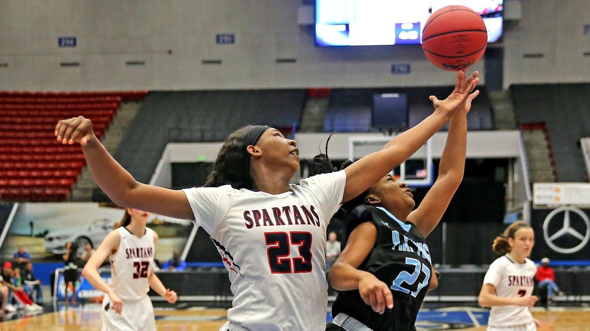 Miami Country Day Koi Love (23) P.K. Yonge Naomi Ross (23) fight for a rebound in the 4A semi-Finals Girl’s State Basketball Championships at the RP Funding Center in Lakeland, Florida, Wednesday, February, 27, 2019.