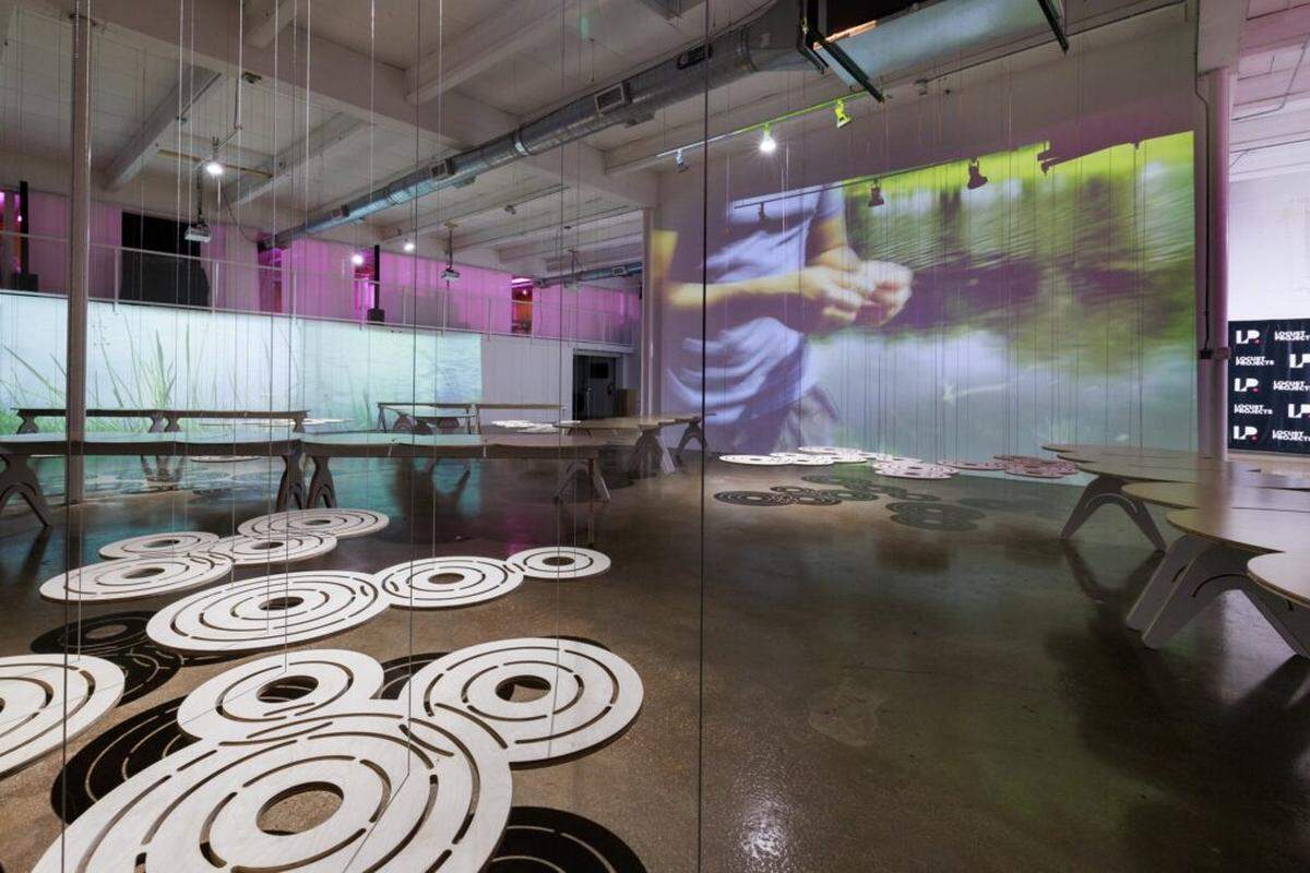 A video projection of Arturo Arrechea skipping stones at Tropical Park is part of the multi-media installation “Bare Tool” (“Herramienta desnuda”) at Locust Projects through Thursday, Jan. 23.