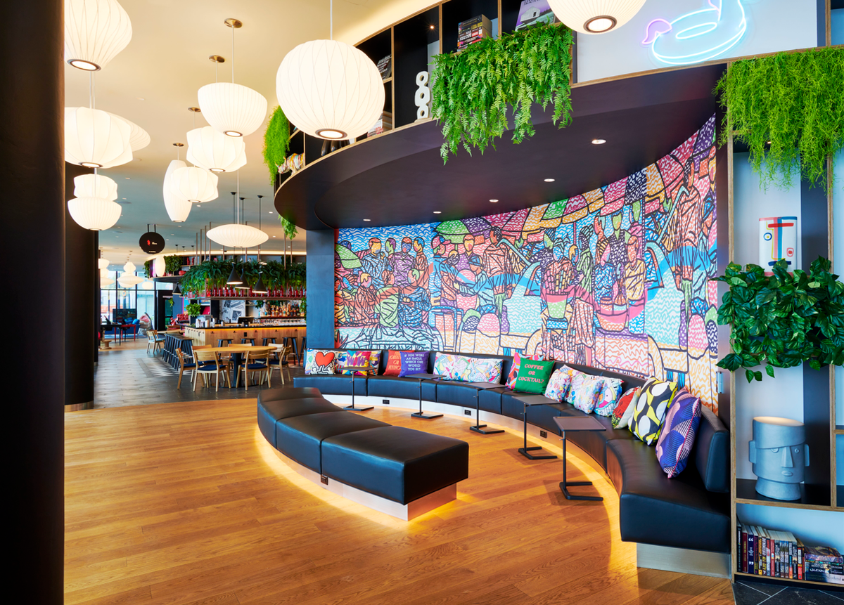 The hotel has a bar, several gathering spaces and a rooftop pool.