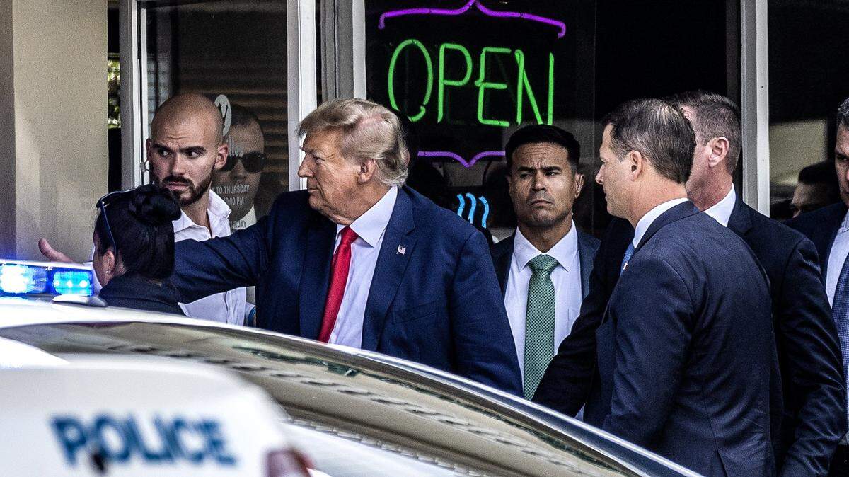 Former President Donald Trump greets supporters at Versailles Restaurant in Little Havana in 2023.