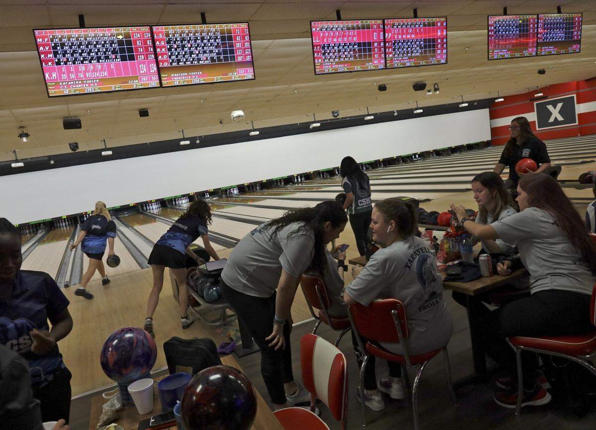 Coral Springs Charter School tammates bowl at Sawgrass Lanes in Tamarac, Florida on Thursday, October 17, 2019.