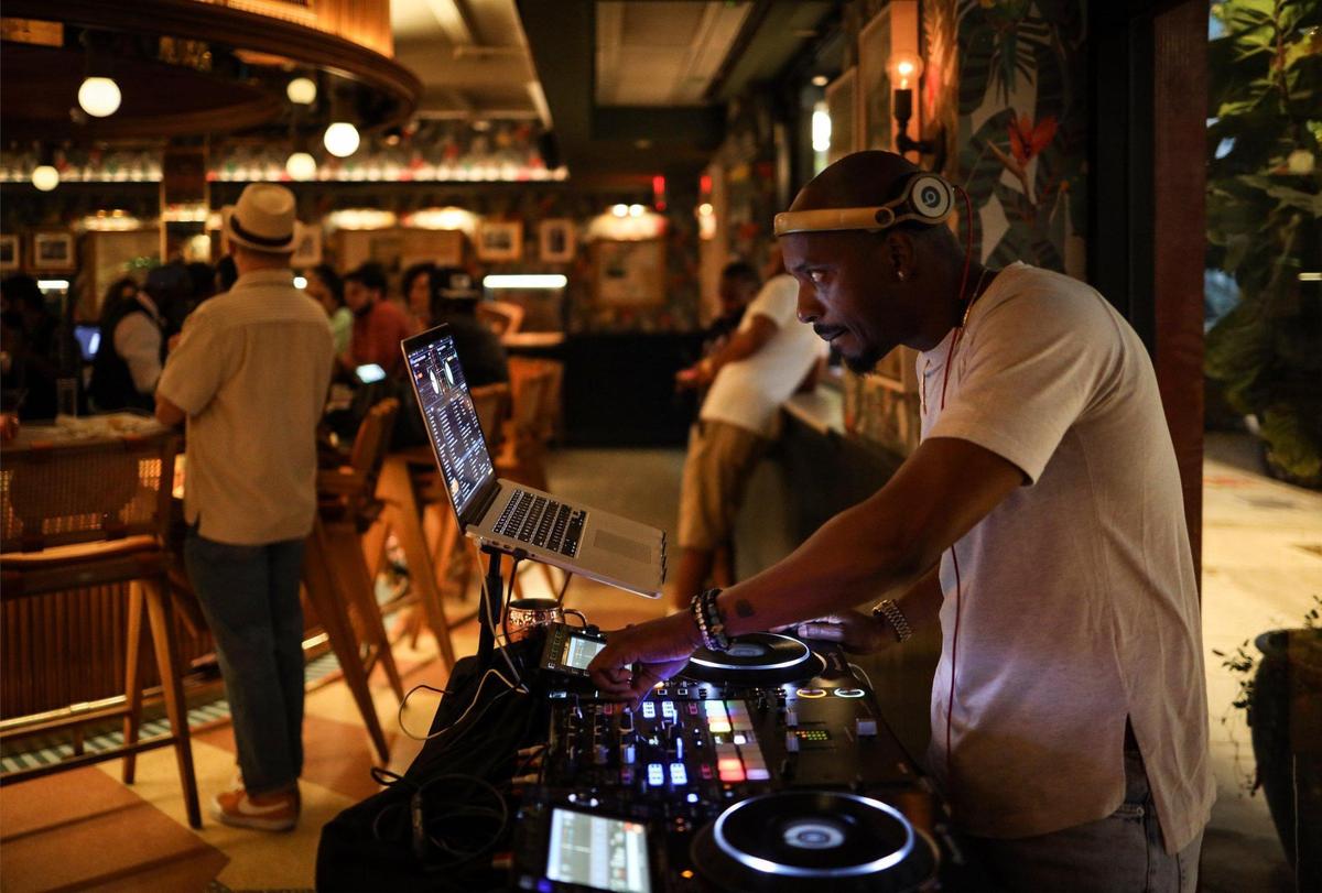 On Tuesday, April 14, 2021, artist and Dj Rahsaan “DJ Fly Guy” Alexander spins at Red Rooster Overtown around the corner to where his art exhibition “To Miami, with Love”: Pandemic Life and Protest by Rahsaan Alexander” is currently exhibited. Hampton Art Lovers curated the show at the Ward Rooming House and runs through May 8, 2021.