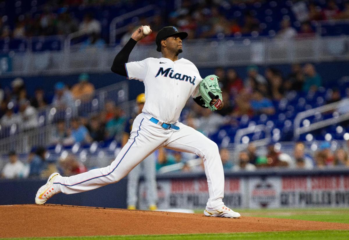 Miami Marlins starting pitcher Edward Cabrera (27) throws the first pitch during a baseball game against the Milwaukee Brewers on Sunday, Sept. 24, 2023, at loanDepot Park in Miami.