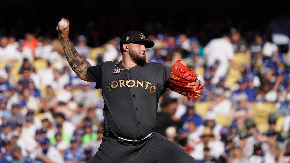 American League pitcher Alek Manoah, of the Toronto Blue Jays, throws a pitch to the National League during the second inning of the MLB All-Star baseball game, Tuesday, July 19, 2022, in Los Angeles. (AP Photo/Mark J. Terrill)